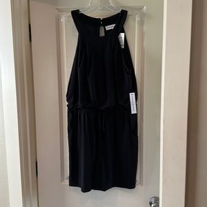 NWT romper size medium.